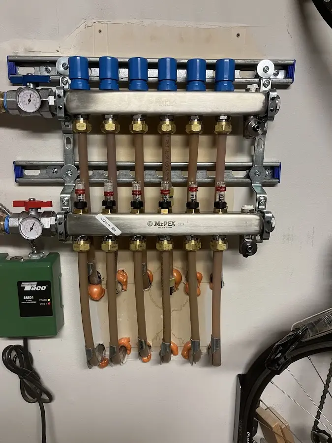 Plumber performing Leak Detection at a residential property in Hopkinton